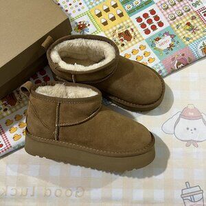 UGG Platform Fleece-Lined Snow Boots